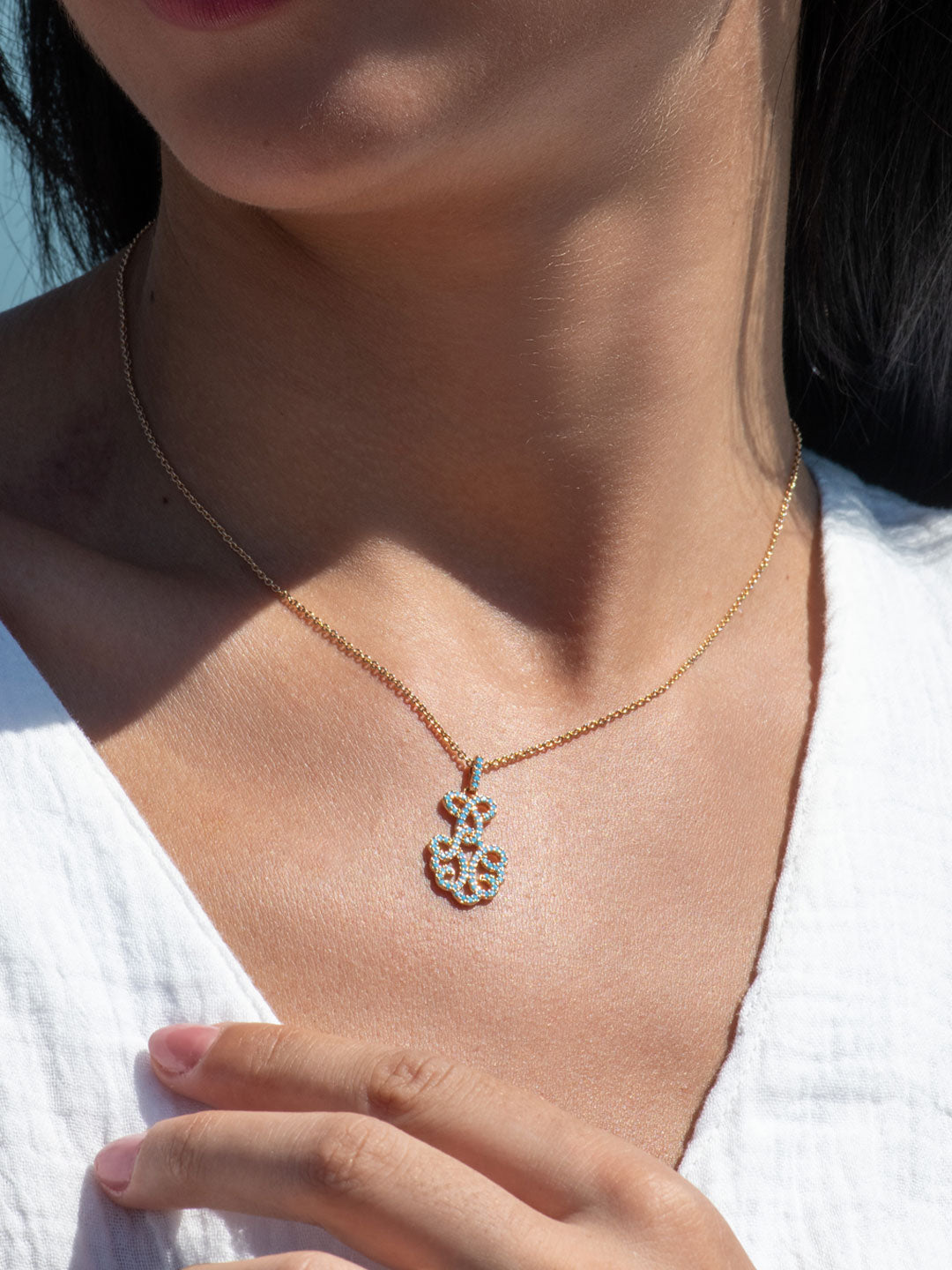 Pendantif PO Arabesque Serti Zircon en Bleu Turquoise